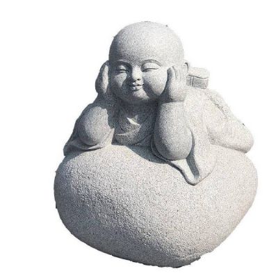 寺院戶(hù)外擺放砂巖雕刻小和尚雕像