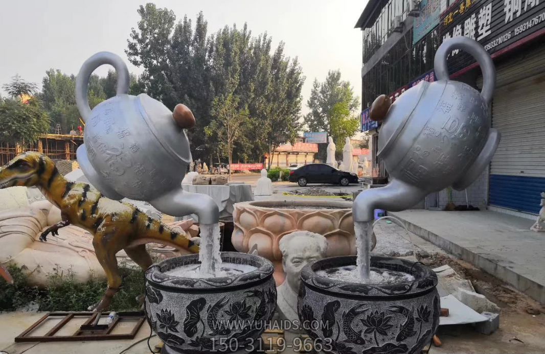 景區不銹鋼創(chuàng )意懸空流水的天壺雕塑
