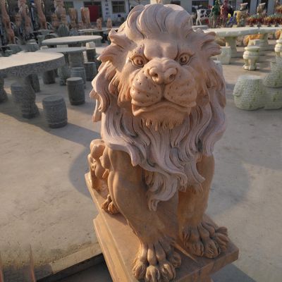 公園創(chuàng  )意晚霞紅石雕坐著(zhù)的獅子雕塑