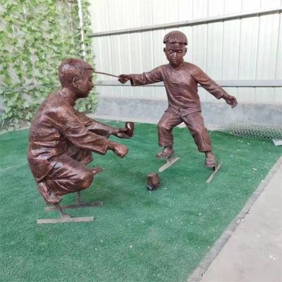 公園擺放玻璃鋼仿銅童趣兒童玩陀螺景觀(guān)小品