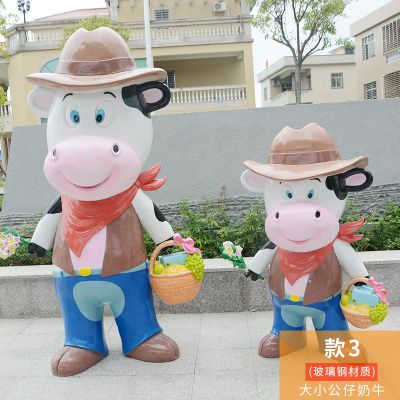 小區擺放兩個(gè)大小公仔玻璃鋼牛雕塑
