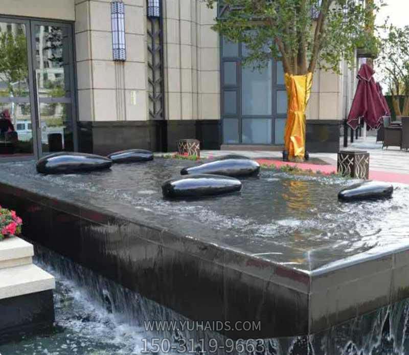 酒店池塘創(chuàng )意抽象水中的鵝卵石雕塑