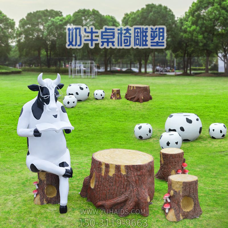 公園中一只坐著(zhù)看書(shū)的奶牛桌椅玻璃鋼牛雕塑 公園中一只坐著(zhù)看書(shū)的奶牛桌椅玻璃鋼牛雕塑