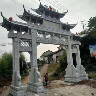 出口景區公墓擺放青石雕刻門(mén)牌坊